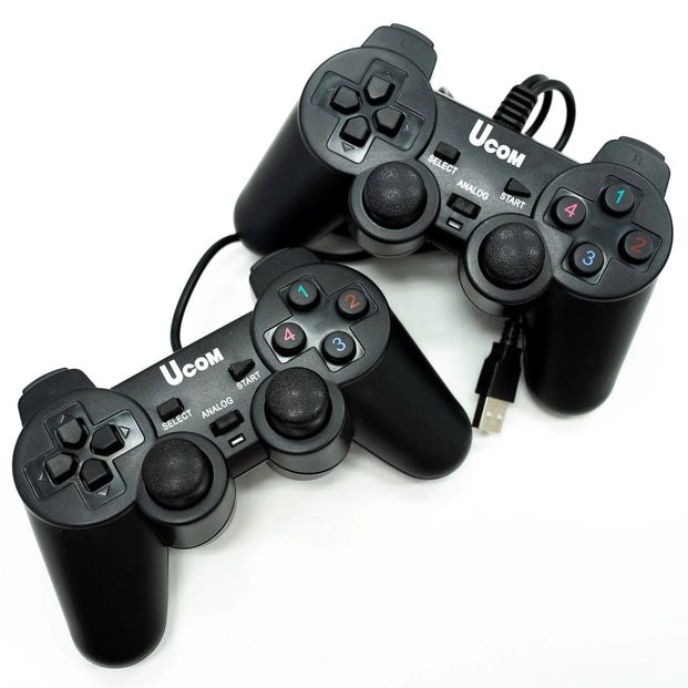 Two Ucom Brand Game Controllers