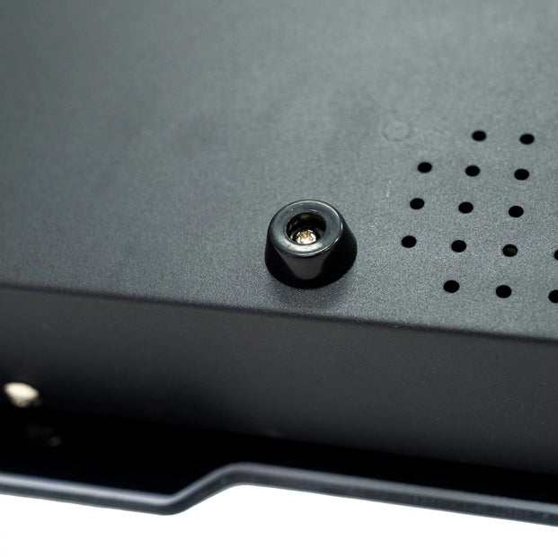 Close-up Of A Rubber Foot On A Black Surface