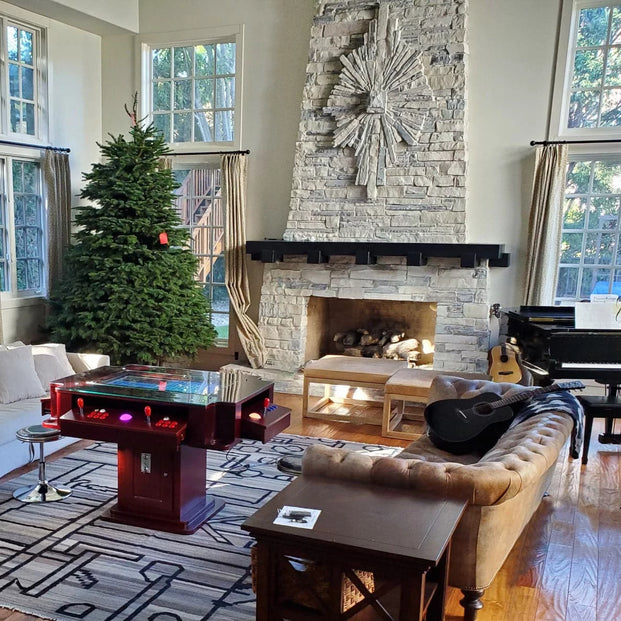 Living room with cocktail arcade machine